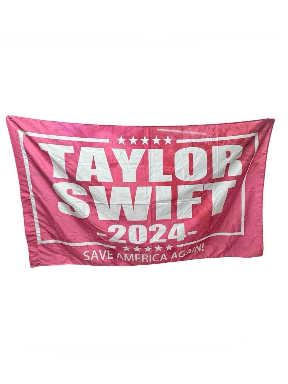 Tapestry / flag with “Taylor Swift 2024 Save America Again!” Written on front.